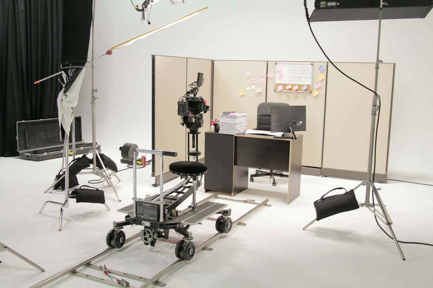 Film production studio set with an office cubicle scene.